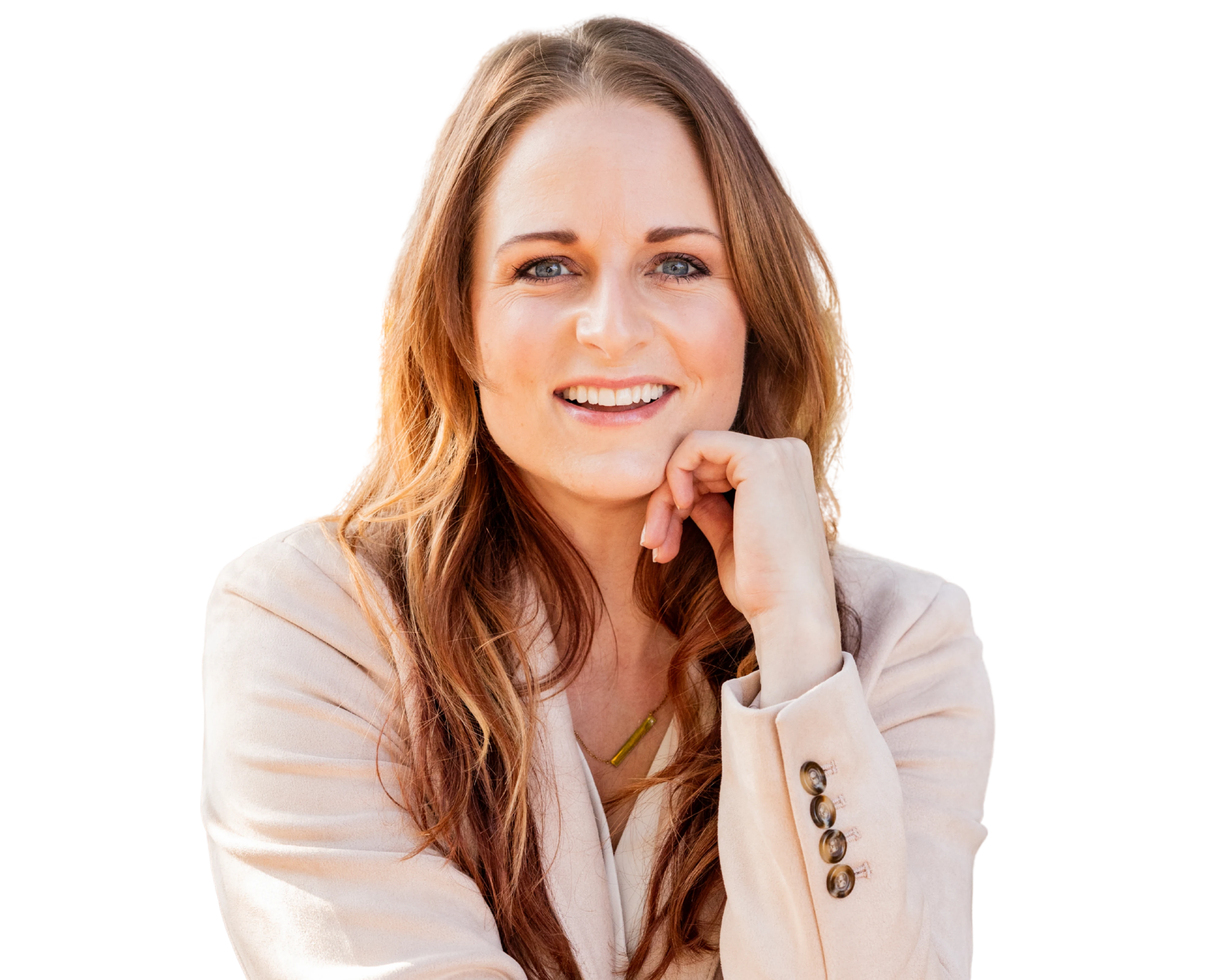 Nicole Roundy smiling in a cream blazer